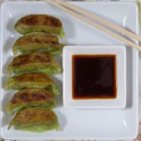 Gyoza · Choice of beef/vegetables potstickers.