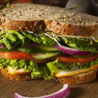 The Vegetarian Sandwich · Fresh slices of avocado, roasted peppers, button mushrooms, red onions, diced sundried tomat...