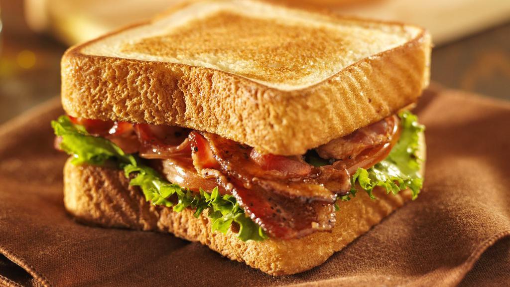 Classic Sleeper Sandwich · Fresh strips of bacon, salsa lito turkey, swiss cheese and mills sauce on fresh roll of sweet bread.