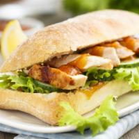 The Classic Chicken Sandwich · Fresh chicken tenders with lettuce, tomatoes, onions, pickles, banana peppers, and american ...