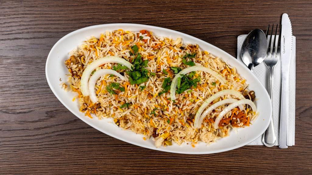 Vegetable Biryani · Veggie. Aromatic basmati rice cooked with blend of mixed vegetables and spices.