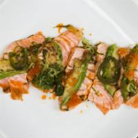 Salmon Tataki (5 Pieces) · Seared salmon sliced with sea salt ponzu sauce, sesame oil, avocado, jalapeño, and tobiko.