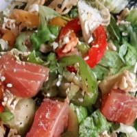 Tuna Poki Salad · Fresh maguro tuna, seaweed salad, organic spring mix, sliced jalapeño, tossed with housemade...