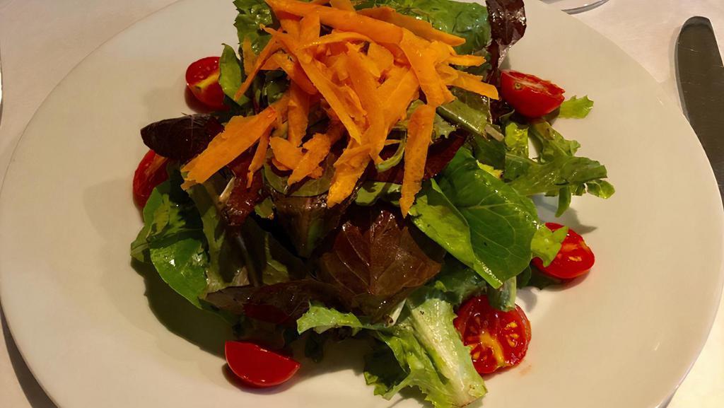 Mista · Organic mixed greens salad, tossed with balsamic vinaigrette.