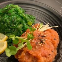 Poki Tuna Salad · Spicy food. Spicy tuna salad with seaweed salad.