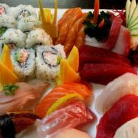 #01. Sushi and Sashimi · 3 Tuna, 3 hamachi, 3 salmon sashimi, 8 nigiri and 8 CA roll.