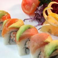 Rainbow · CA roll topped with tuna, salmon, shiromaguro, ebi and tail.