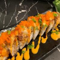 Kansai · Tuna, Salmon, Hamachi topped with Unagi and Avocado. Sauces - unagi sauce, spicy mayo, and w...