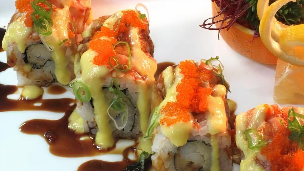 Double Double · Shrimp tempura imitation crab topped with shrimp, avocado & fish egg. Sauce - unagi sauce.
