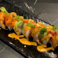 John · Shrimp tempura, imitation crab topped with tuna, salmon, yellowtail, avocado & fish egg. Sau...