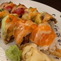 Go Go · Shrimp tempura, spicy tuna, cucumber, avocado topped with tuna, salmon, unagi & fish egg. Sa...