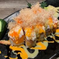 Sweet Surrender · Spicy tuna, shrimp tempura, soft shell crab topped with tuna, salmon, shino maguro, tai, ebi...