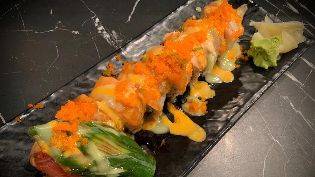 S.P Rainbow · Shrimp tempura, imitation crab, topped tuna, tai, salmon, ebi, shinomaguro and fish egg. Sauce - unagi sauce, spicy mayo, wasabi sauce.