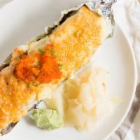 Lion King · CA roll topped with salmon and bake and fish egg. Sauce - bake sauce, unagi sauce.