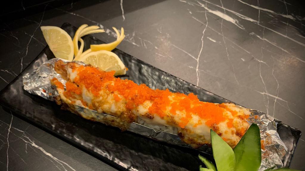 Bob · Shrimp tempura, imitation crab topped BBQ albacore and fish egg. Sauce - bake sauce, wasabi sauce.