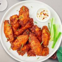 Sweet Tang Wings · Fresh chicken wings breaded, fried until golden brown, and tossed in sweet chili sauce.