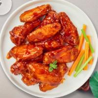 Spice Vice Wings · Fresh chicken wings breaded, fried until golden brown, and tossed in hot sauce.