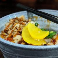 Gyu Don · Rice bowl with thinly sliced beef, marinated with BBQ sauce.