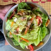 Market Street Salad · Butter lettuce, early girl tomato, Persian cucumber, pickled carrots, seed mix, dried aprico...