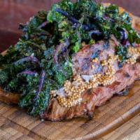 Grilled Natural Bavette Steak · Lollipop Kale, Seasonal Veggie, Pickled Mustard Seeds.