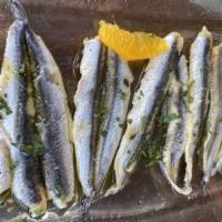 Boquerones · white anchovies, fresh bread, olive oil