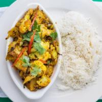 Aloo Gobhi · Cauliflower and potatoes cooked with tomatoes and spices.