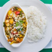 Vegetables Korma · Mixed vegetables cooked with cream, herbs and cashews.