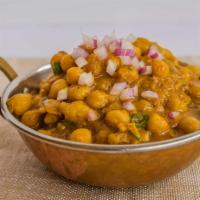 Chana Masala · Garbanzo beans in a blend of tomatoes, onions, green peppers and spices.