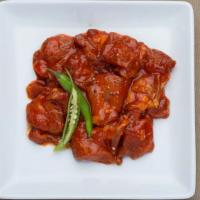 Spicy Chicken (1 lb) · Per pound. Spicy and contains raw meat.
