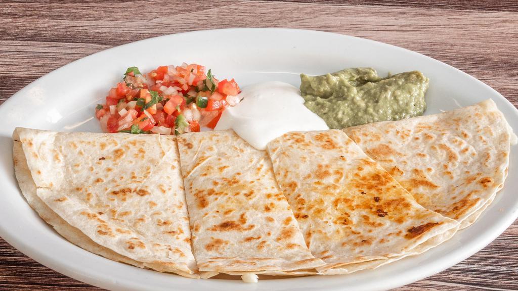 Deluxe Super Quesadilla · Flour tortilla with melted jack cheese, guacamole, sour cream, pico de gallo and your choice of meat.