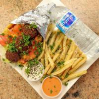#11 Falafel Gyro  combo · comes with fries and drinks on a vegetarian wrap.