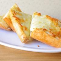 Cheese Garlic Bread · Fresh made Garlic Bread with cheese served on a roll.