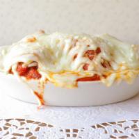 Meatballs · Gourmet meatballs slow cooked in our homemade marinara covered with mozzarella.