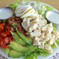 Cobb Salad · Fresh chopped lettuce, hard boiled egg, chicken, bacon, avocado, tomatoes and blue cheese.