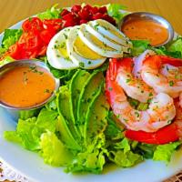 Shrimp Louis · Most popular.  mixed greens topped with shrimp, sliced egg, avocado, beets, diced tomatoes, ...