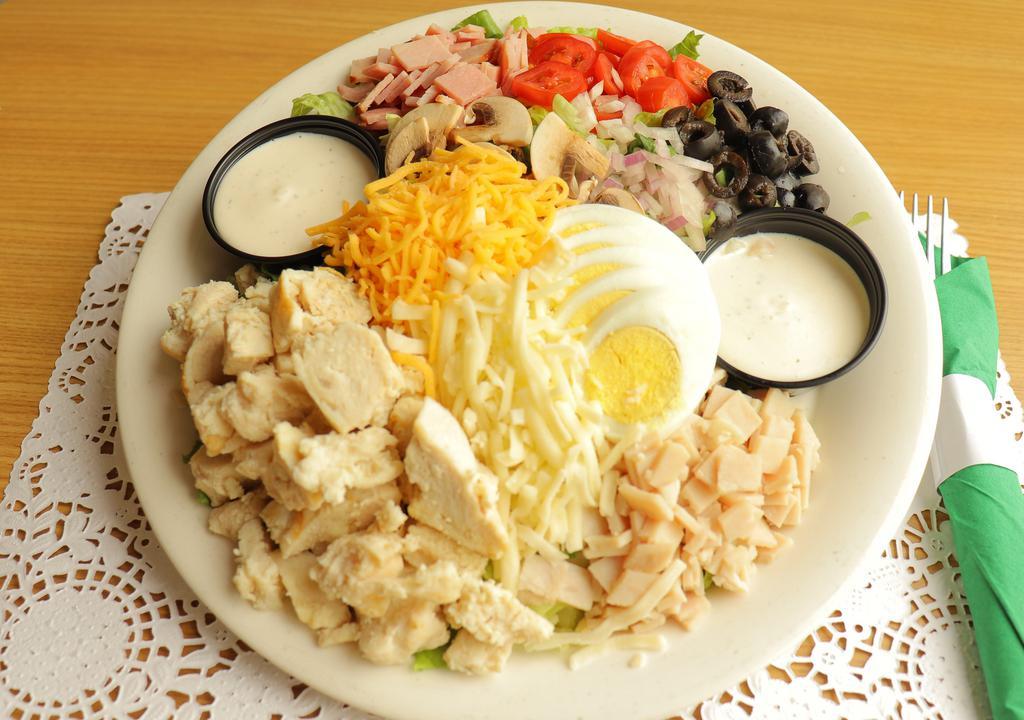 Chef's Salad · Mixed greens with turkey, ham, jack and cheddar cheese, sliced egg, mushrooms, dice tomatoes, sliced cucumber, sweet red onion, olives and your choice of dressing served on the side.