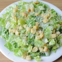 Caesar Salad · Crisp romaine lettuce, croutons, grated Parmesan cheese and creamy caesar dressing.