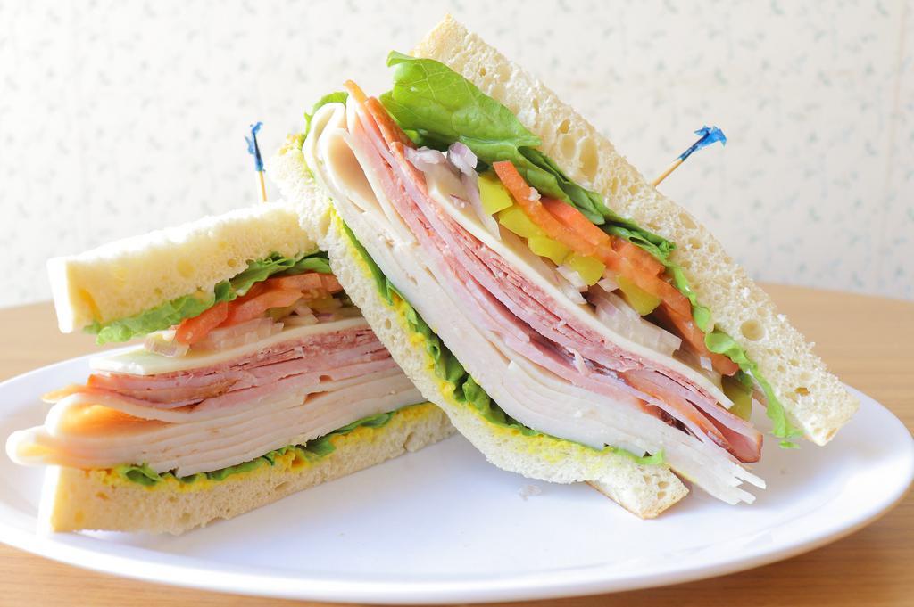Mount Diablo · Turkey, ham, salami, jack cheese, leaf lettuce, mayo, mustard, pickles, sweet red onions and tomato served on sourdough bread.