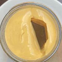 Butterscotch & Chocolate Pot De Crème · Served with chocolate butter crunch