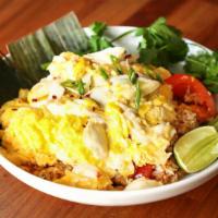 Thai Style Crab Omurice · Garlic butter fried rice with onion, carrot, tomato topped with soft easy scramble eggs and ...