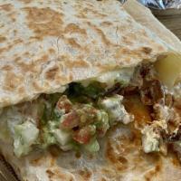 La Perla Quesadilla · Choice of meat-carnitas, al pastor, carne asada, or grilled chicken. Flour quesadilla with M...