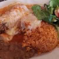 Tamales (2 Items) · Pork or chicken. Served with rice, beans, and salad.