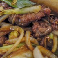 45. Mongolian Beef · Beef, green onion and onion in hot brown sauce. Hot and spicy.