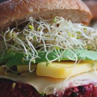 Avocado Burger · Beef Patty, Tomato, onion, Pickles, Cheese, Lettuce, Avocado, Sprouts and sauce.