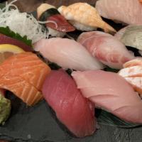 S7-B. Sushi & Sashimi Combo · Sashimi (6 pcs), and assorted nigiri sushi (10 pcs).