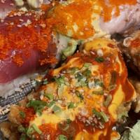 S3-Q. Fire & Ice Roll · Shrimp tempura inside, tuna, kani and tobiko on top.