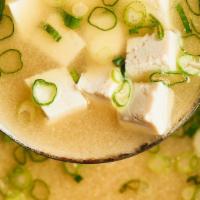 Miso Soup · Served with tofu and green onion.