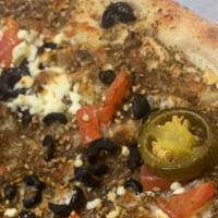 Middle east pizza  · Made with olive oil ,Mozzarella cheese ,feta cheese ,black olives , and our special thyme se...