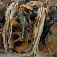Shroom Tacos · Seasonal mixed mushrooms, butternut squash purée, sage curtido, corn tortillas