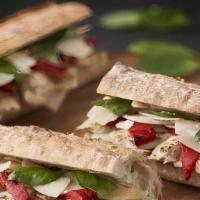 Provence Chicken Pesto Baguette · Grilled Chicken, Parmesan, Mozzarella, Roasted Bell Pepper, Pesto, Basil, Baguette.

Contain...